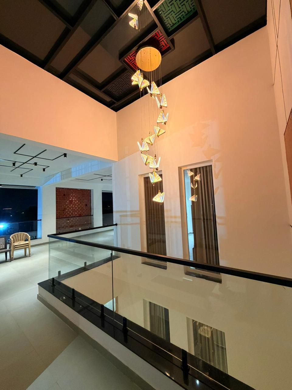 D Treatfarms string-light terrace lit up beautifully at night — Pocharam Hyderabad